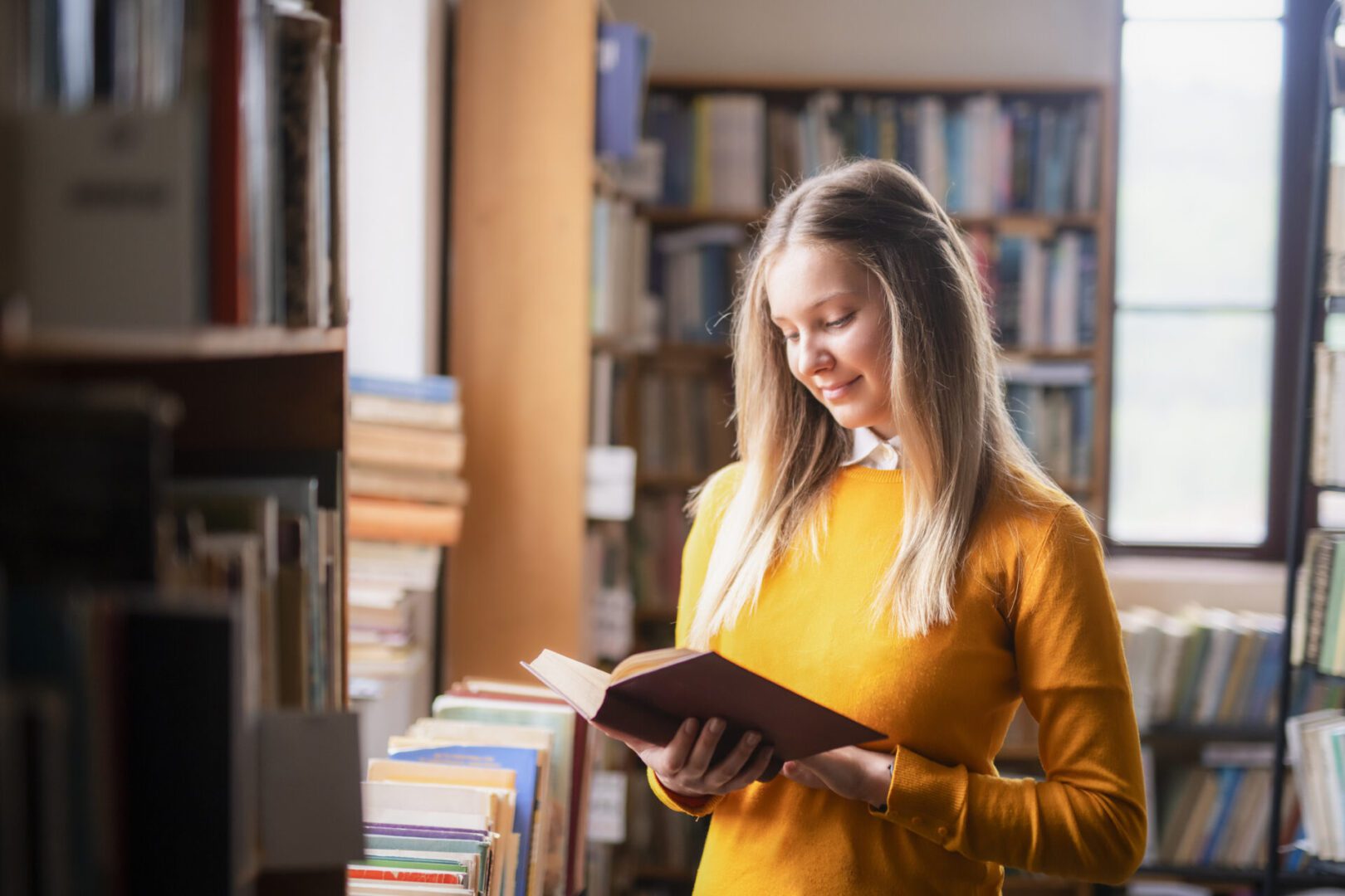 Young woman enjoying a book