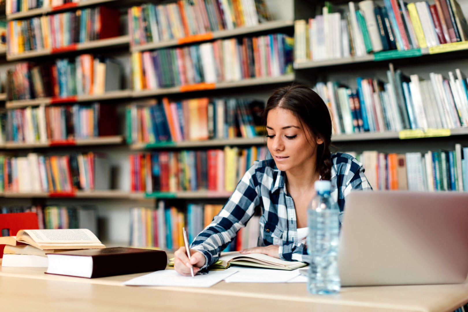 Student studying in a library